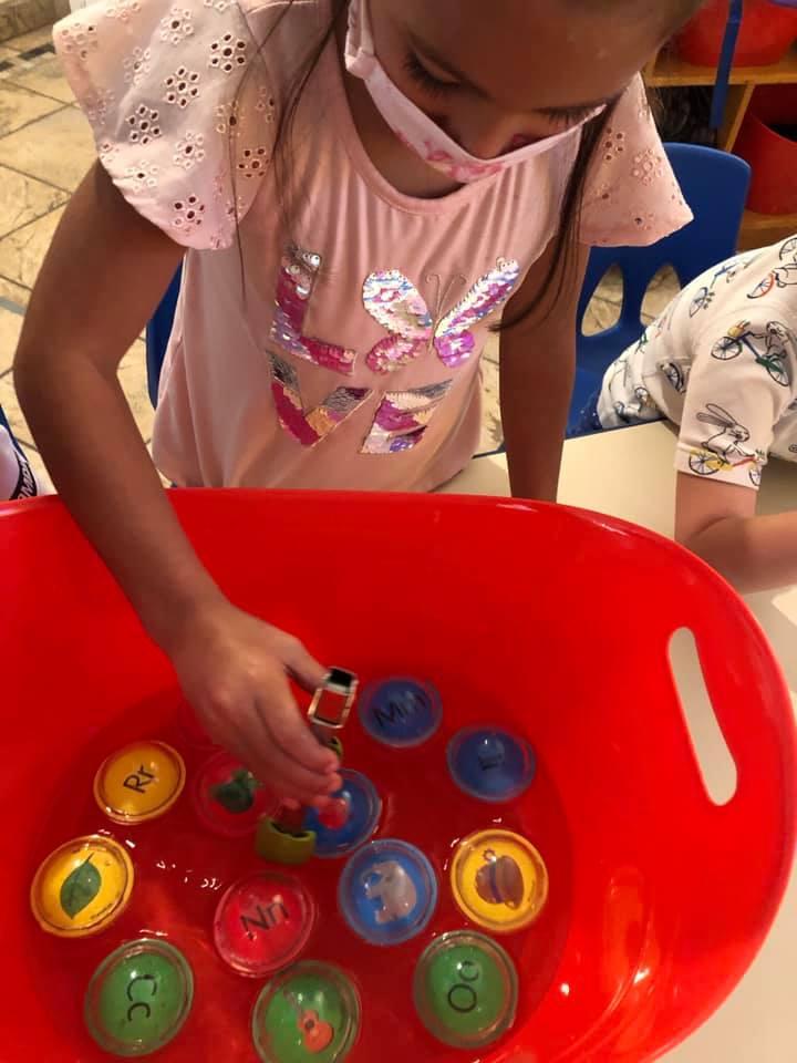 Young learner exploring alphabet activities